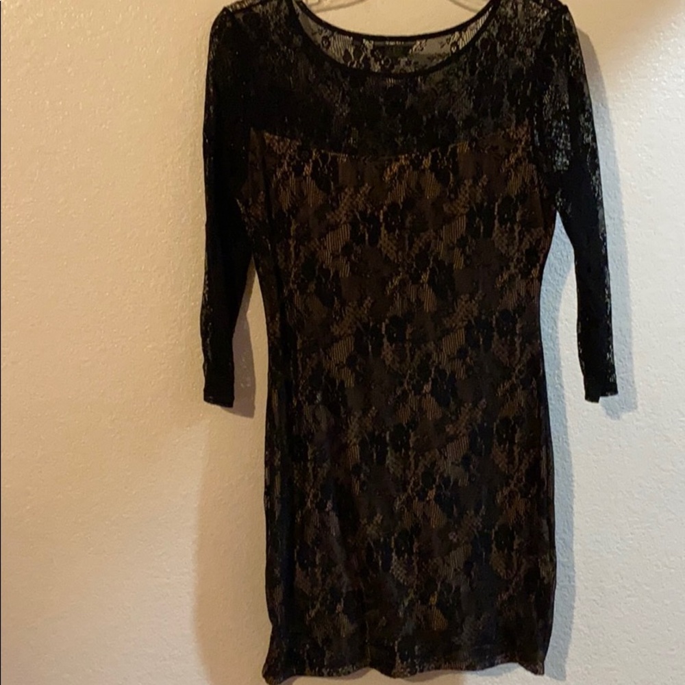Black lace dress with tan lining size large.